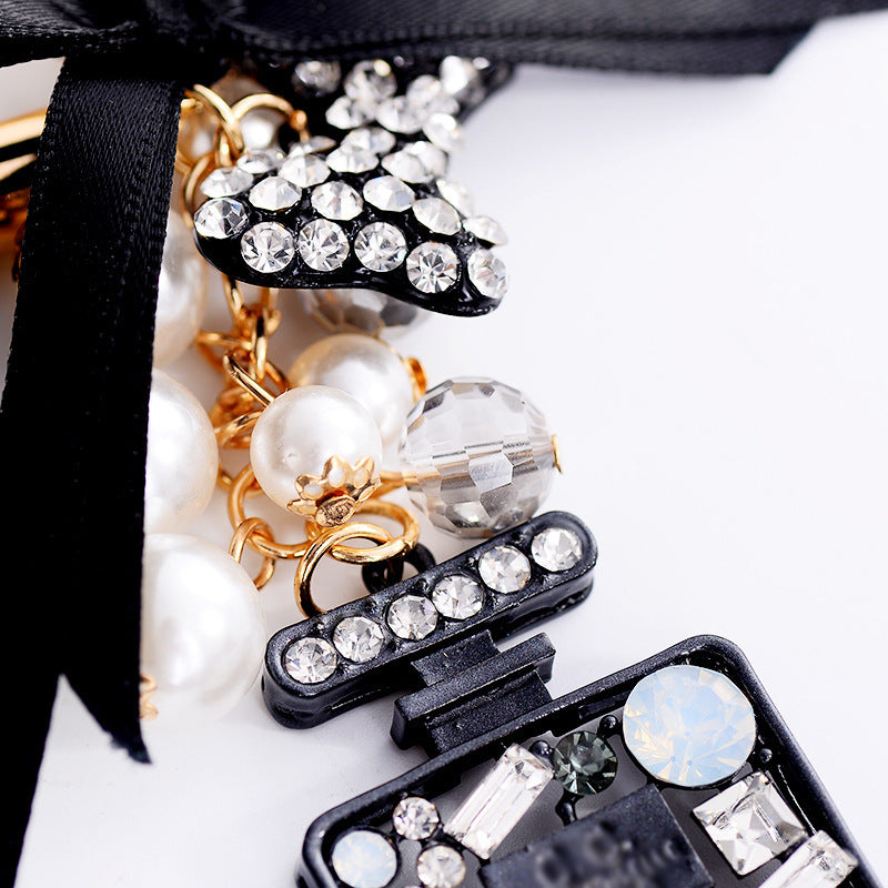 Wholesale Bow Ice Silk Tassel Perfume Bottle Zinc Alloy Keychain