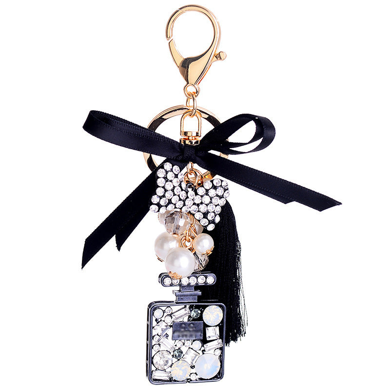 Wholesale Bow Ice Silk Tassel Perfume Bottle Zinc Alloy Keychain