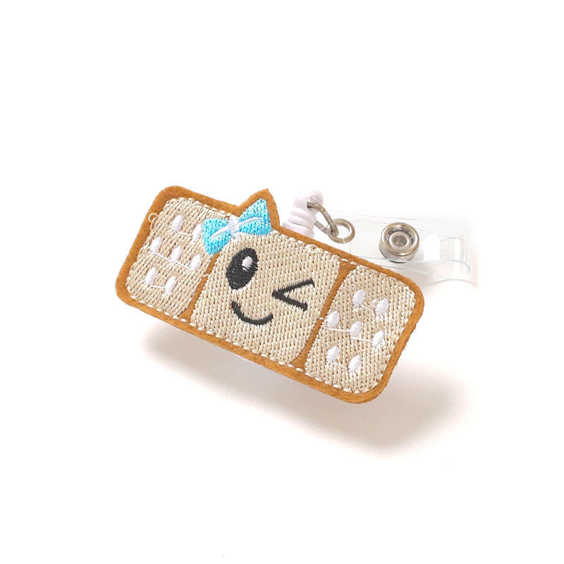 Wholesale Badge Reels Fabric Smiley Face Retractable Keychain