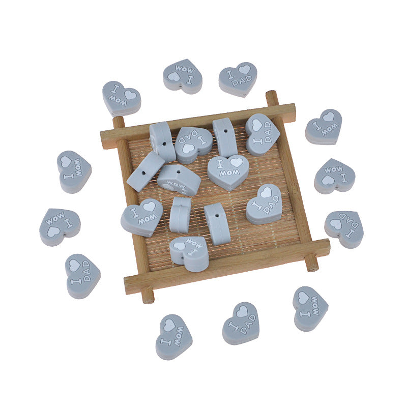 Al por mayor 20pcs bebé dentición amor corazón silicona cuentas de silicona