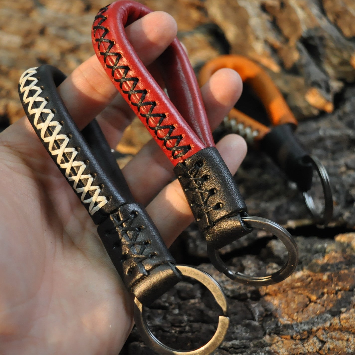 Wholesale Creative Cowhide Sewing and Woven Keychains