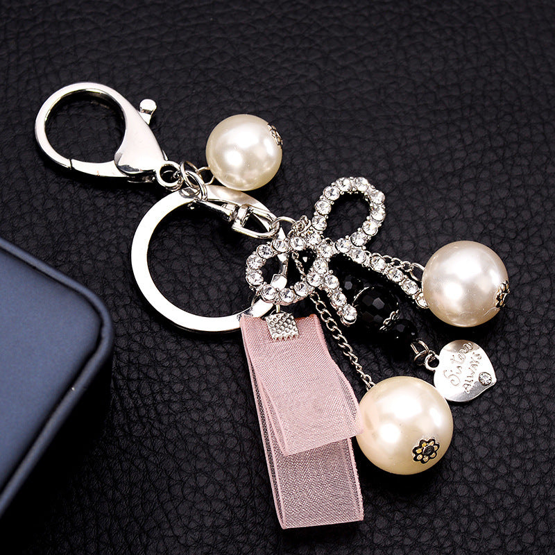 Wholesale Pearl Streamer Love Diamond Bow Keychain