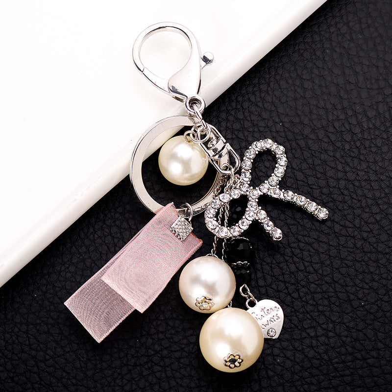 Wholesale Pearl Streamer Love Diamond Bow Keychain