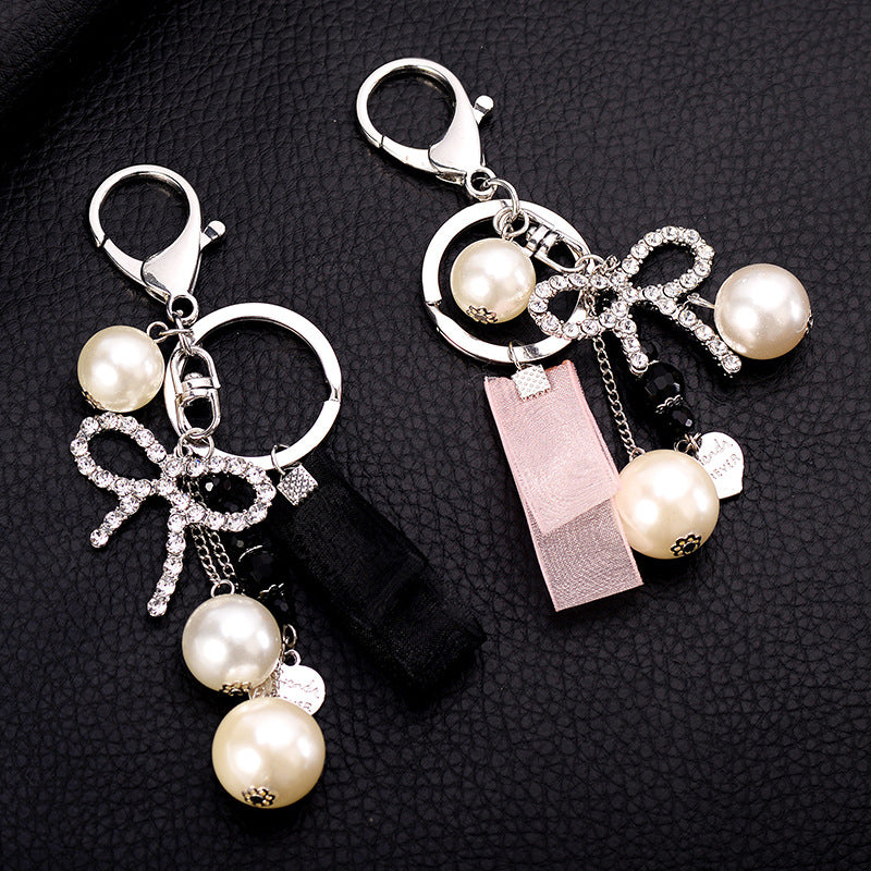 Wholesale Pearl Streamer Love Diamond Bow Keychain