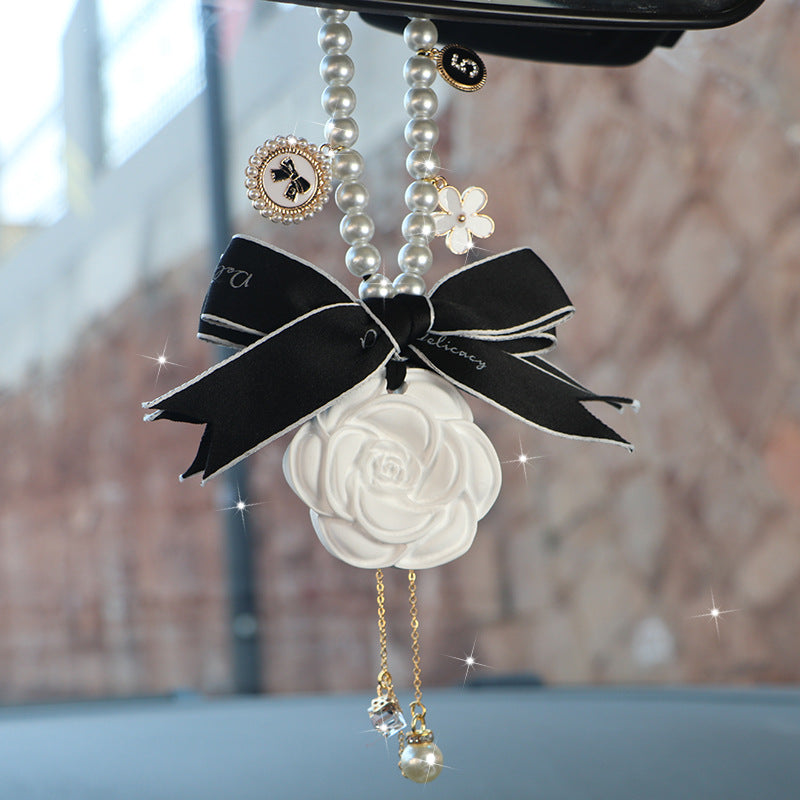 Wholesale Camellia Car Fragrance Expanding Stones Pendant