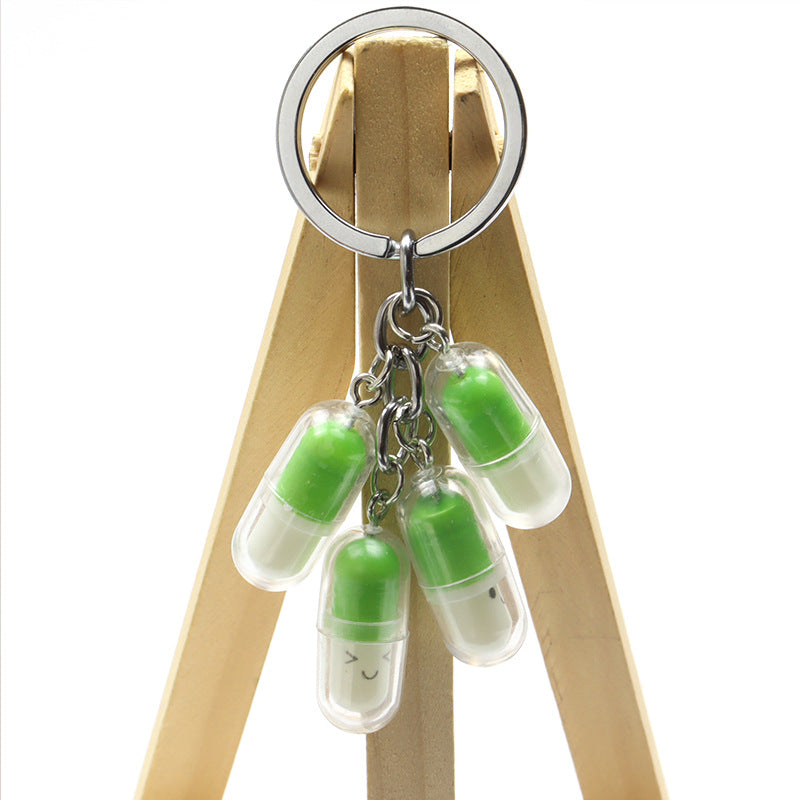 Wholesale Acrylic Cute Smiley Face Capsule Pendant Keychain