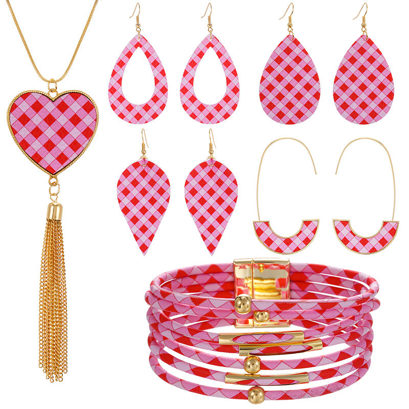 Conjunto de brazalete de arete de cuero de la serie de amor rosa al por mayor