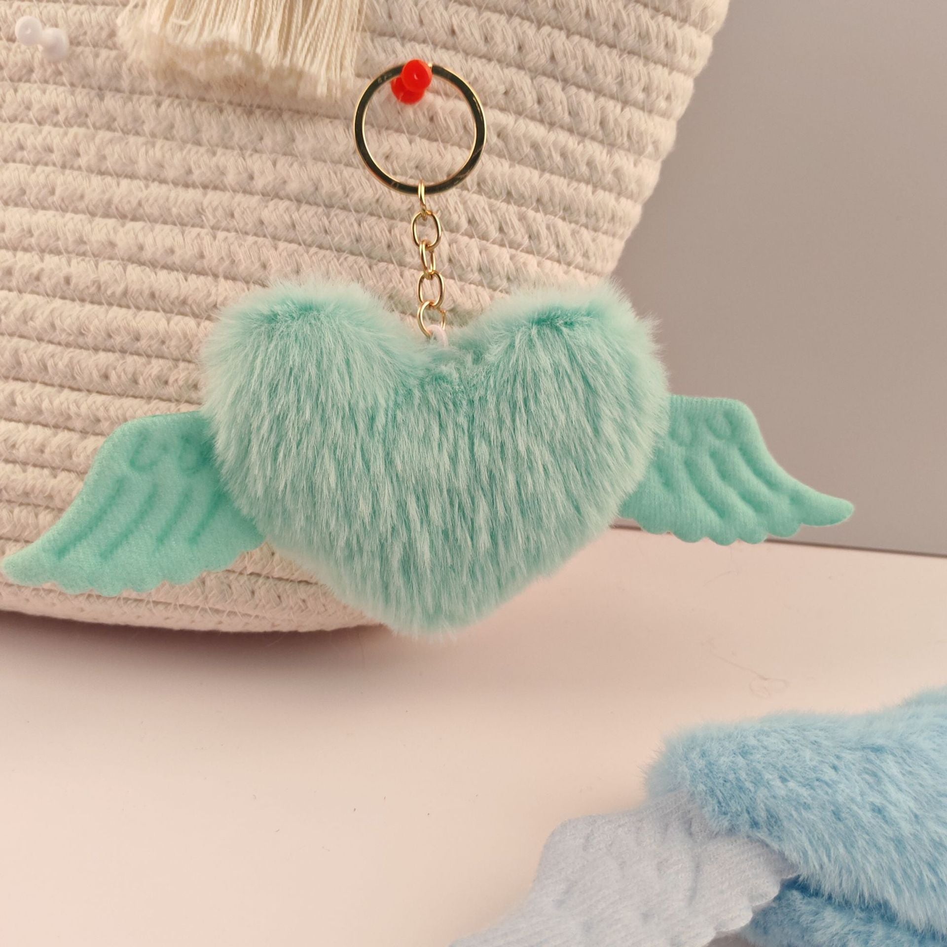 Wholesale Heart wings fur ball keychain
