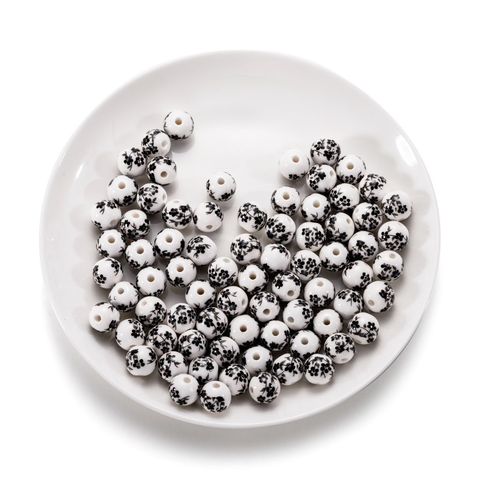 Al por mayor 10pcs/paquete de colgantes de ciruela de cerámica de estilo chino cuentas de cuerda de bricolaje de bricolaje
