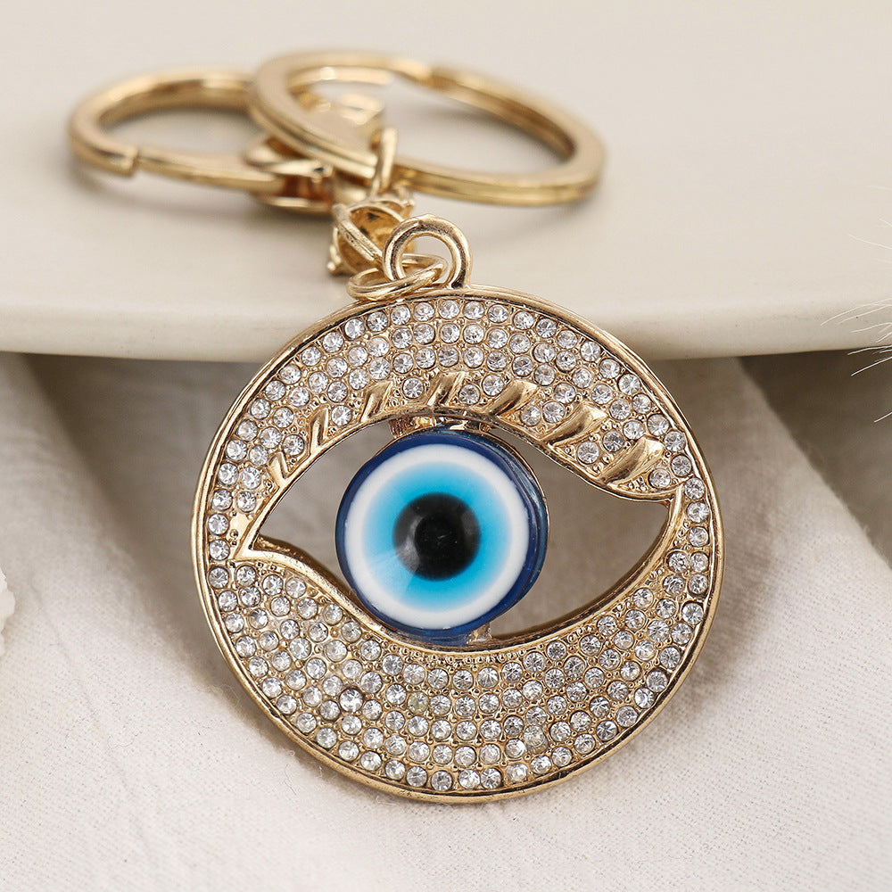 Wholesale Creative Devil's Eye Metal Diamond Keychain