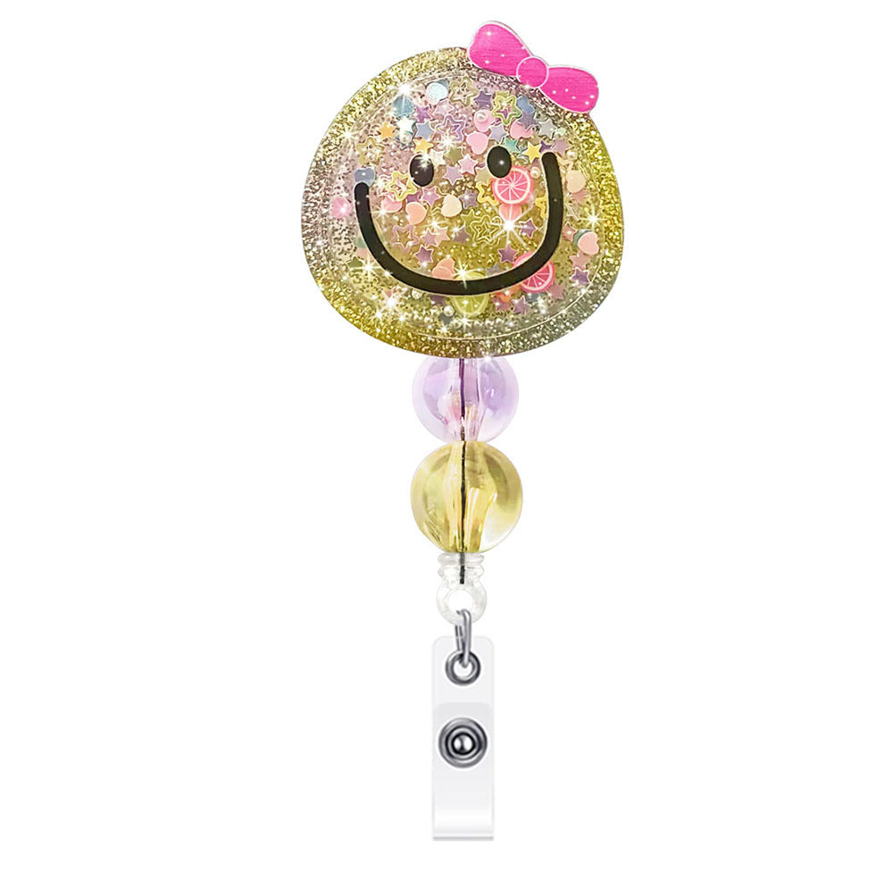 Wholesale Flowing Sand Beaded Dinosaur Smiling Face Milk Tea Cup Emblem Scroll Retractable Plastic Keychain