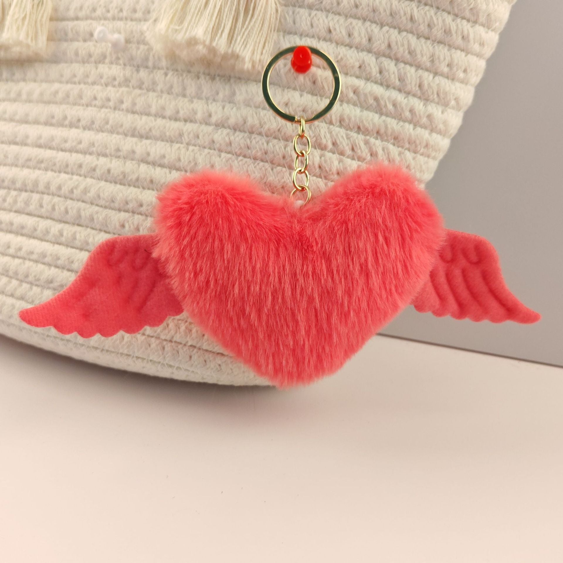 Wholesale Heart wings fur ball keychain