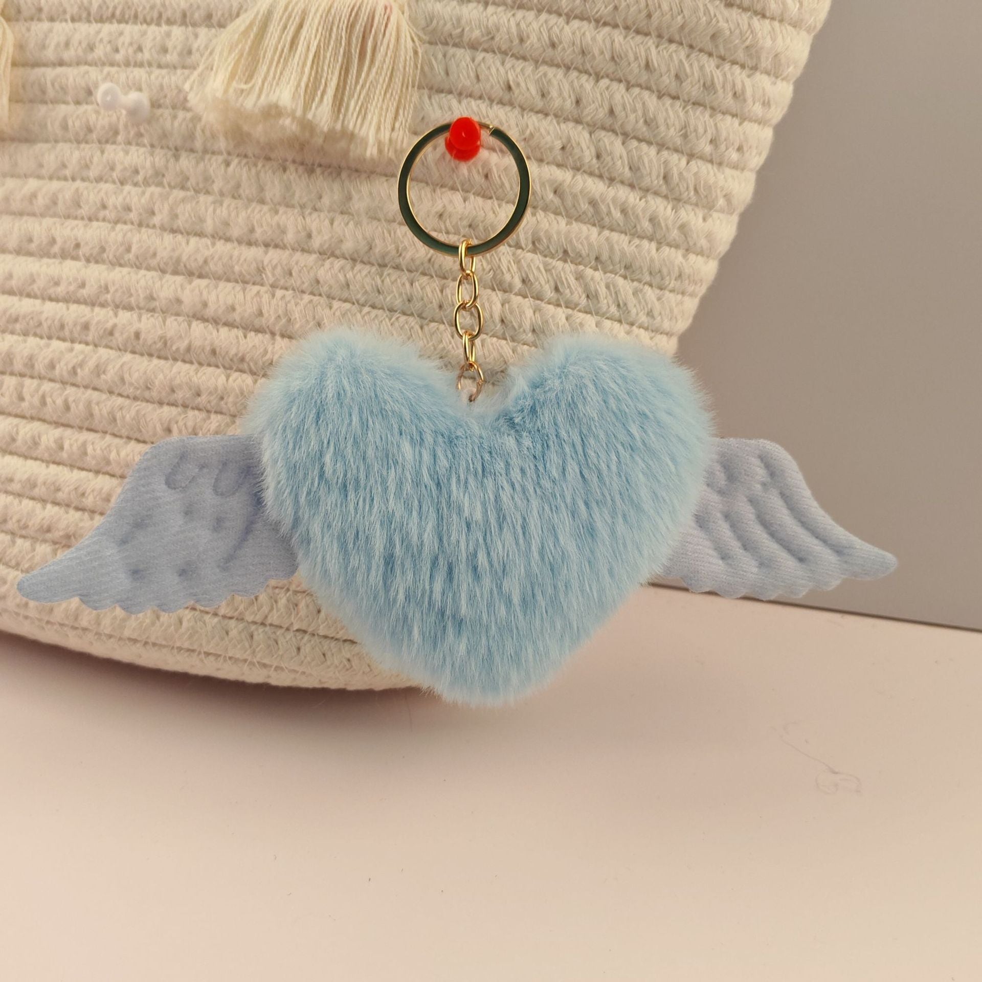 Wholesale Heart wings fur ball keychain