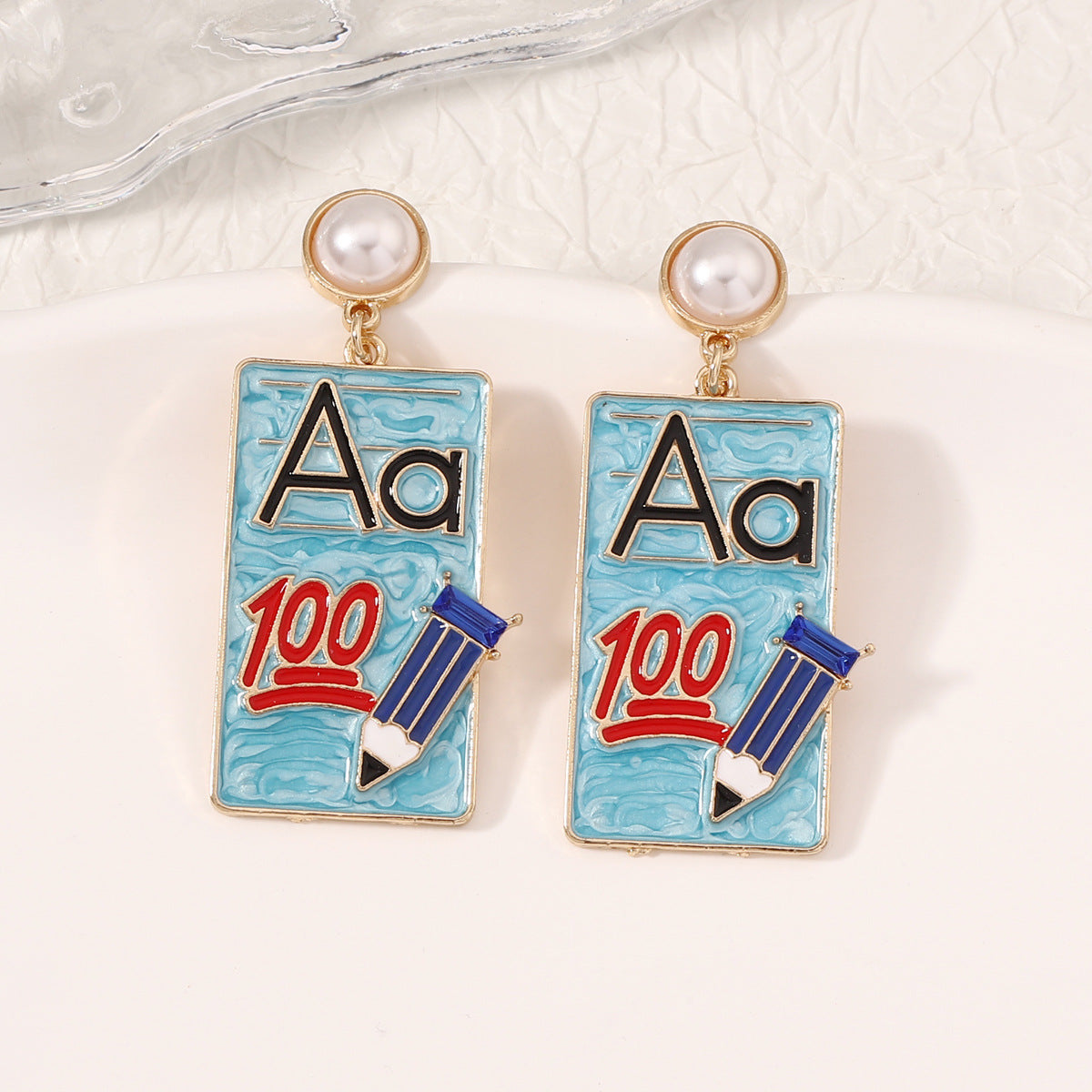 Wholesale of Diamond Alloy Earrings for Starting School Season Books
