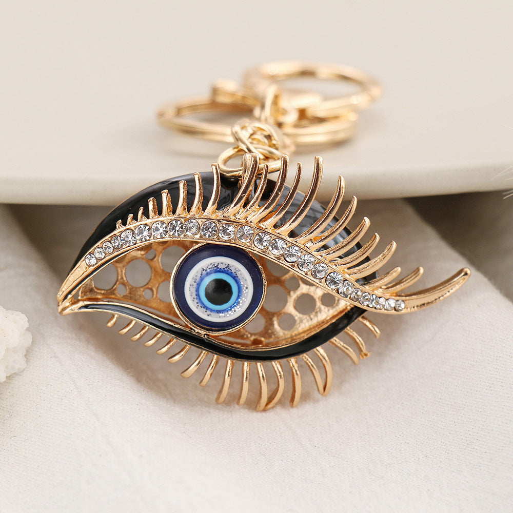 Wholesale Creative Devil's Eye Metal Diamond Keychain