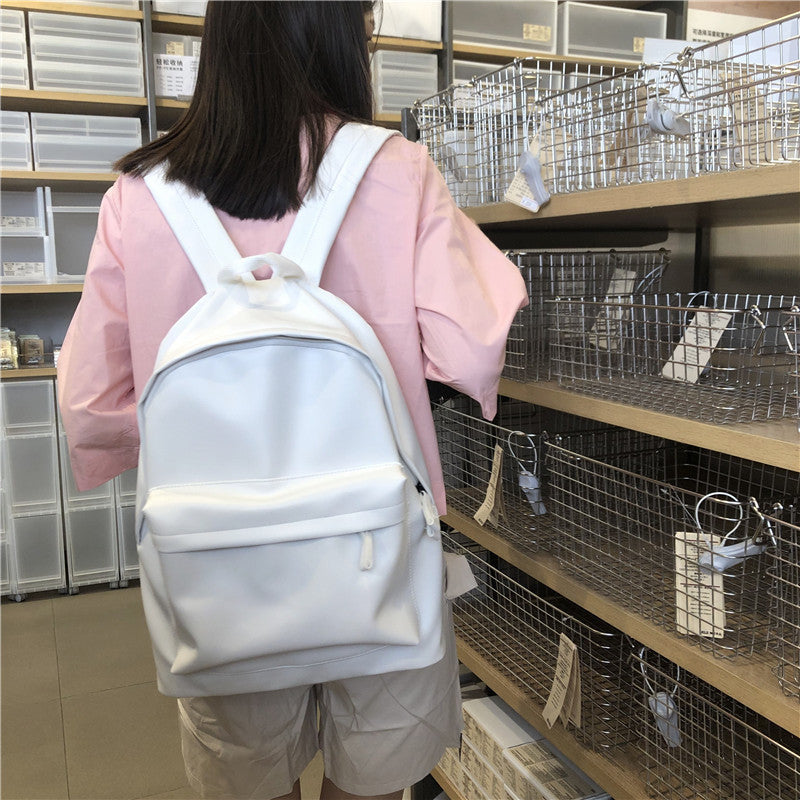 Wholesale Simple Black and White Leather Casual Backpacks