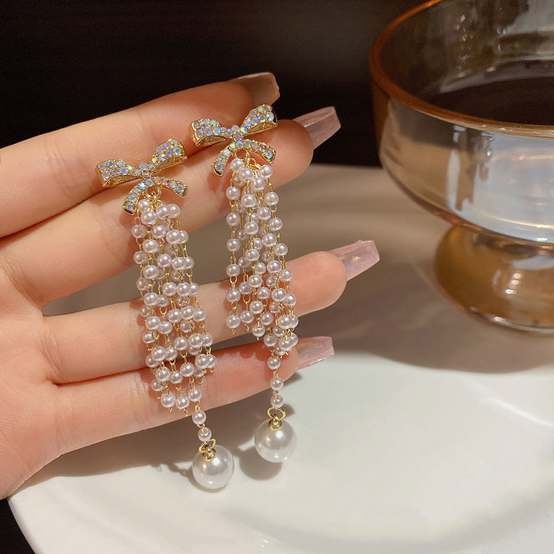 Wholesale Bow Knot Pearl Tassel Alloy Earrings