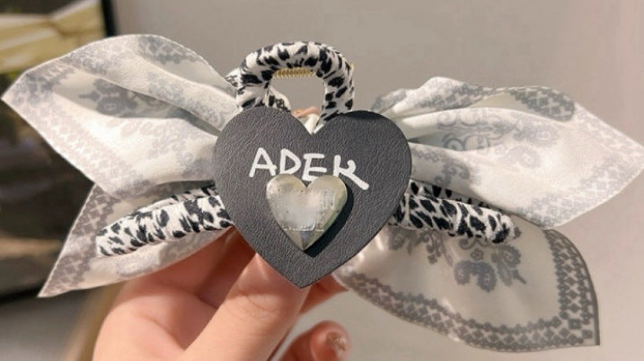 Wholesale Double-sided Cashew Flower Heart Bow Summer Holiday Fashion Hairpin