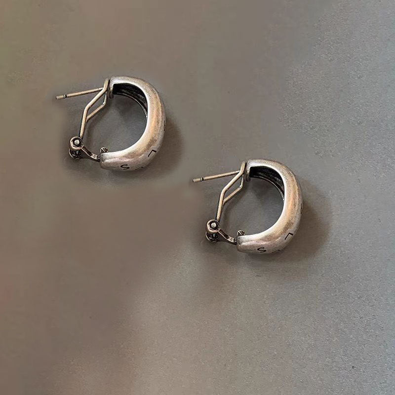 Wholesale Gold and silver retro letter Hong Kong style temperament distressed earrings