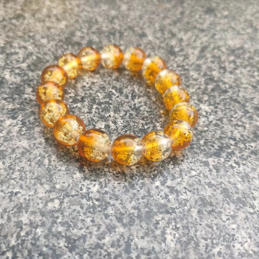 Brazalete de vidrio luminoso de fantasía de dos colores de 12 mm