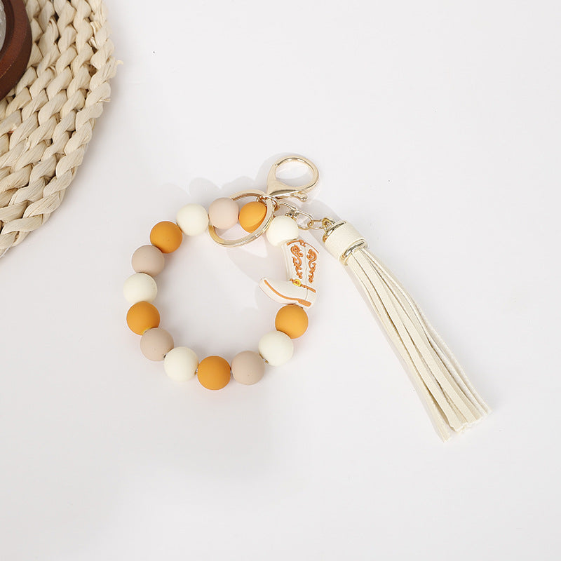 Wholesale 10pcs Halloween Cowboy Boots Silicone Tassel Wrist Keychain