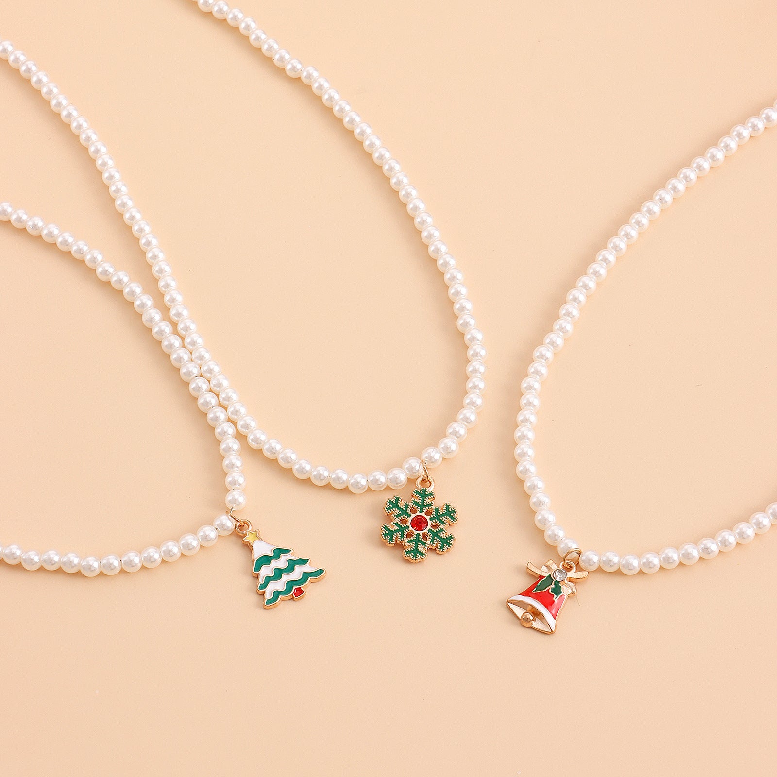 Wholesale Pearl Drop Oil Snowflake Bell Christmas Tree Necklace Sweater Chain