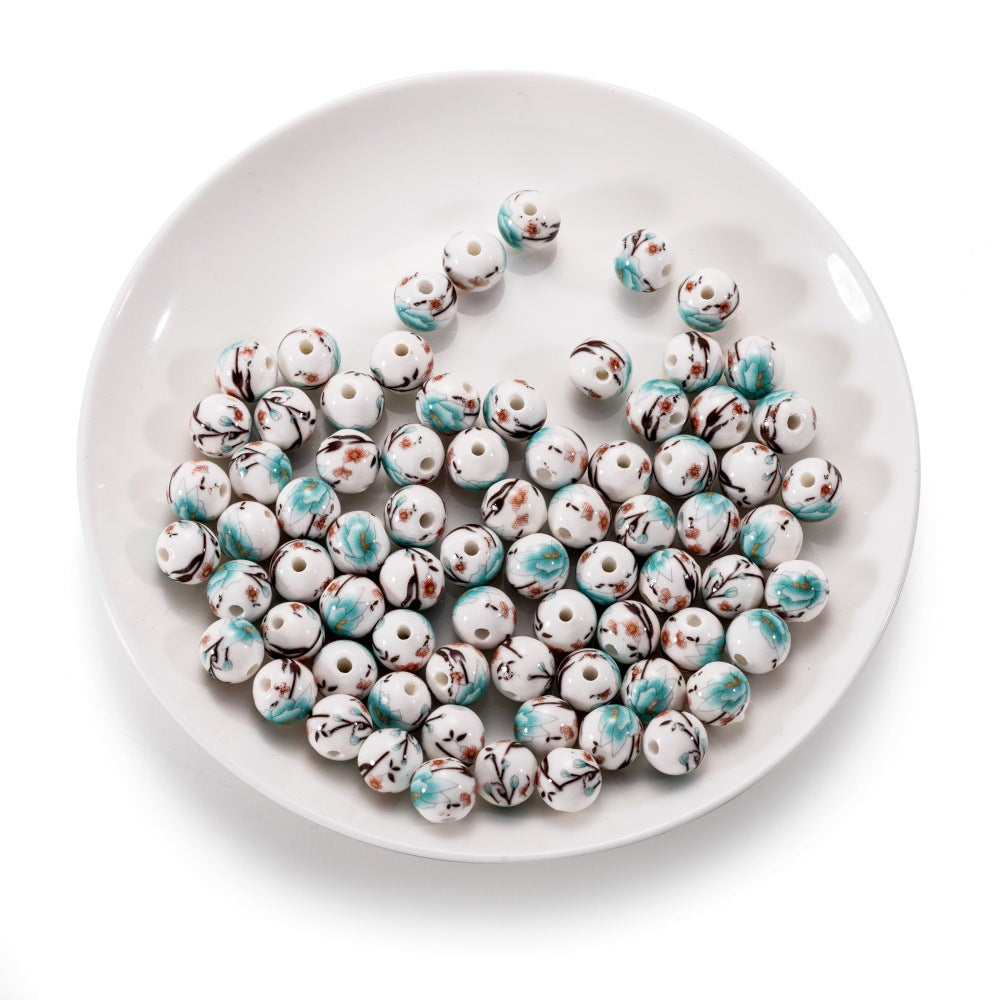 Al por mayor 10pcs/paquete de colgantes de ciruela de cerámica de estilo chino cuentas de cuerda de bricolaje de bricolaje