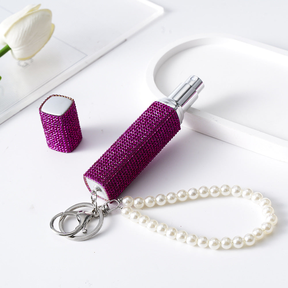 Wholesale Diamond-studded creative 10ml perfume bottle keychain