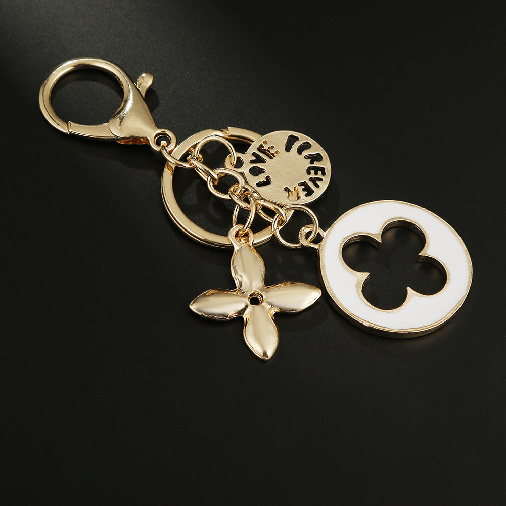 Wholesale Diamond-drip Oil Crystal Quatrefoil Zinc Alloy Keychain