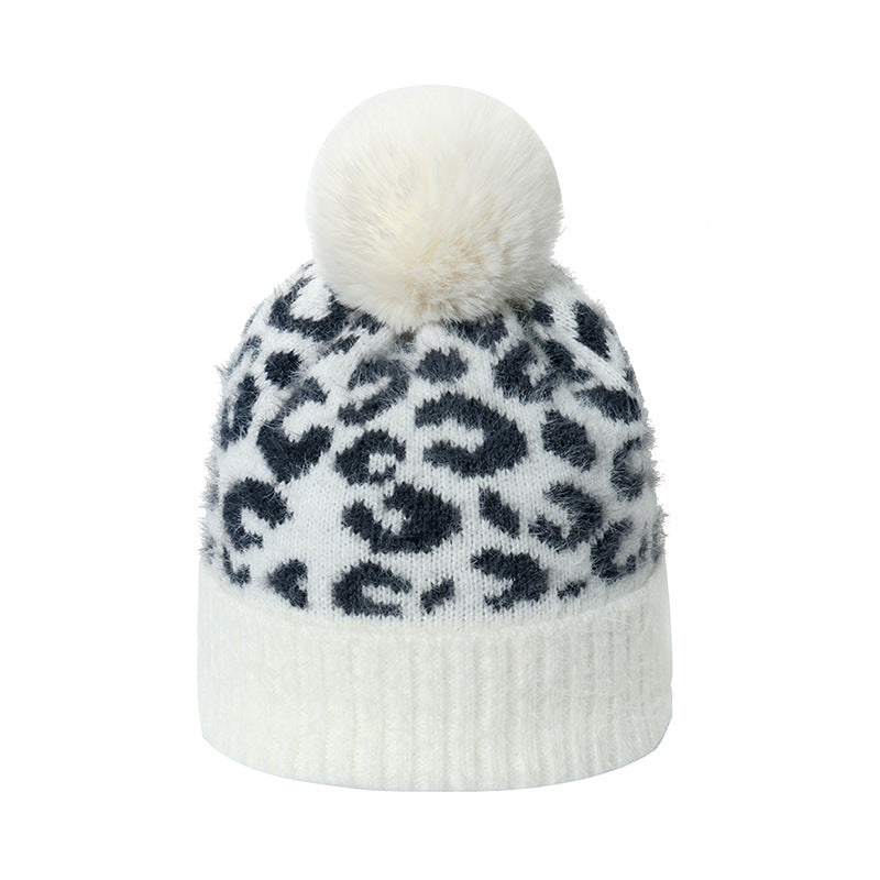 Sombrero de punto de punto de pom pom pom pom.