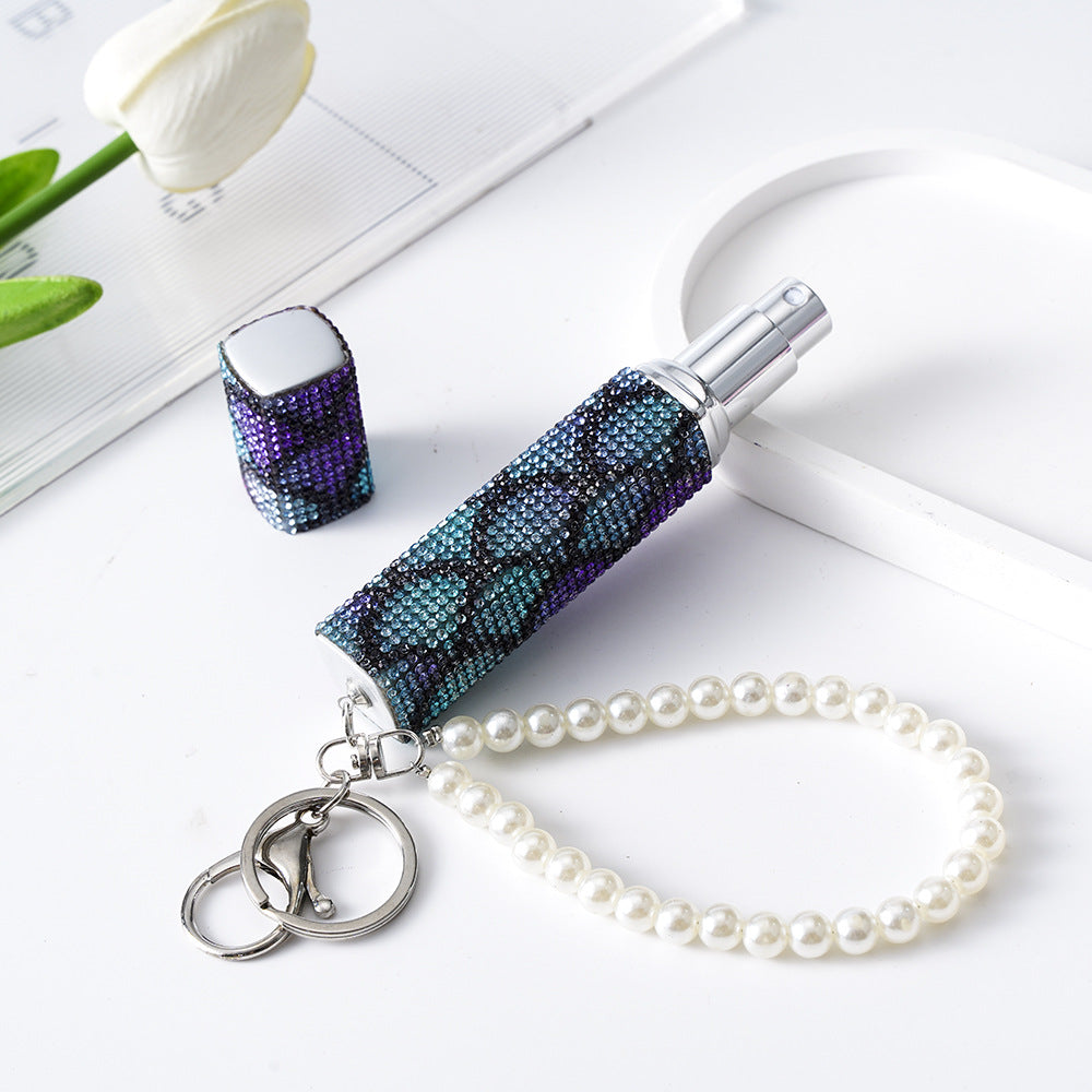 Wholesale Diamond-studded creative 10ml perfume bottle keychain