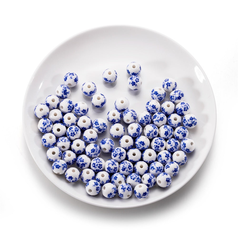 Al por mayor 10pcs/paquete de colgantes de ciruela de cerámica de estilo chino cuentas de cuerda de bricolaje de bricolaje