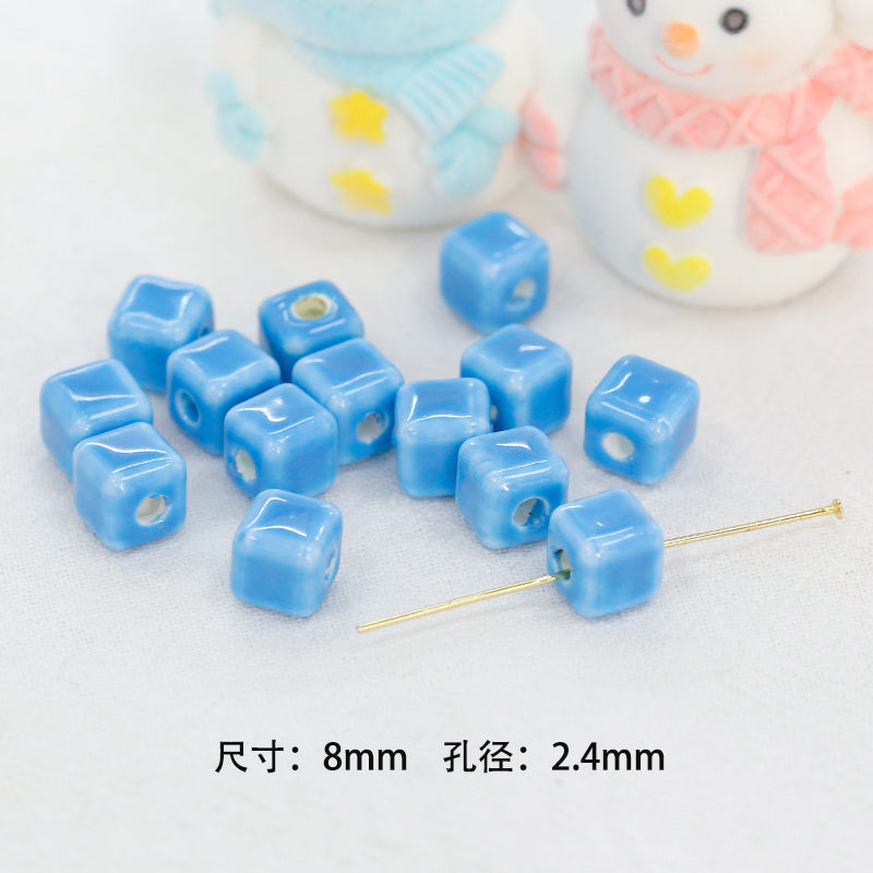 Al por mayor 30pcs japonés azul fresco cerámica linda acacia bean cordero cuentas