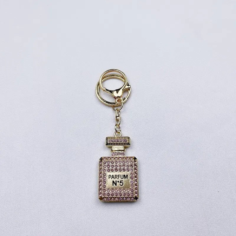 Wholesale Diamond-studded perfume bottle creative metal keychain