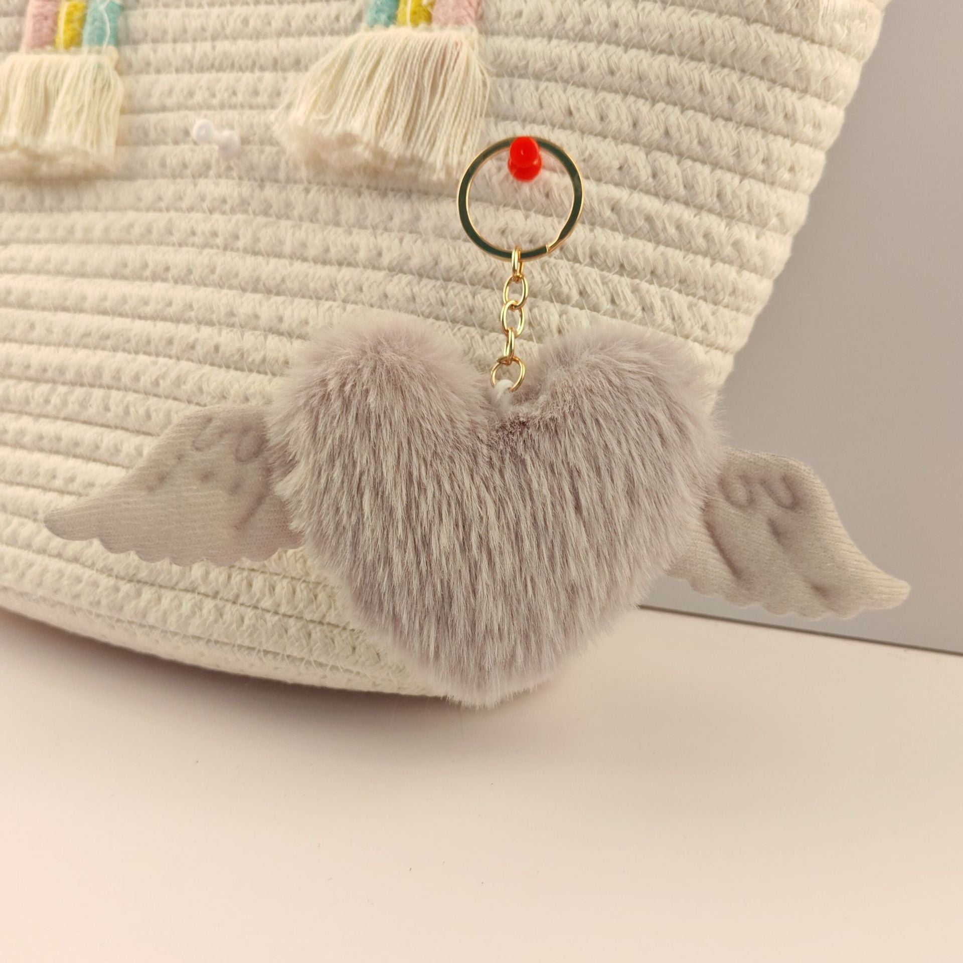 Wholesale Heart wings fur ball keychain
