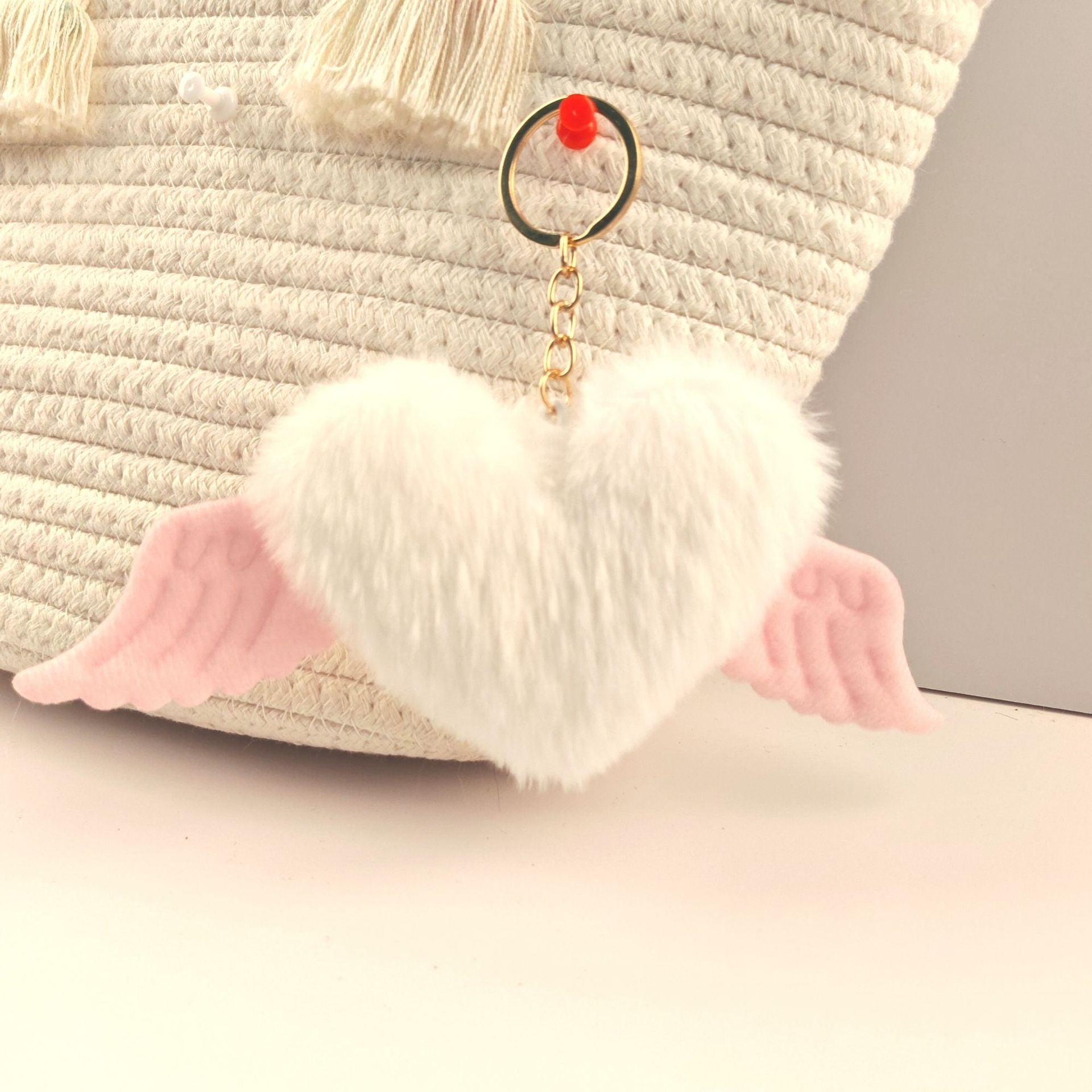 Wholesale Heart wings fur ball keychain