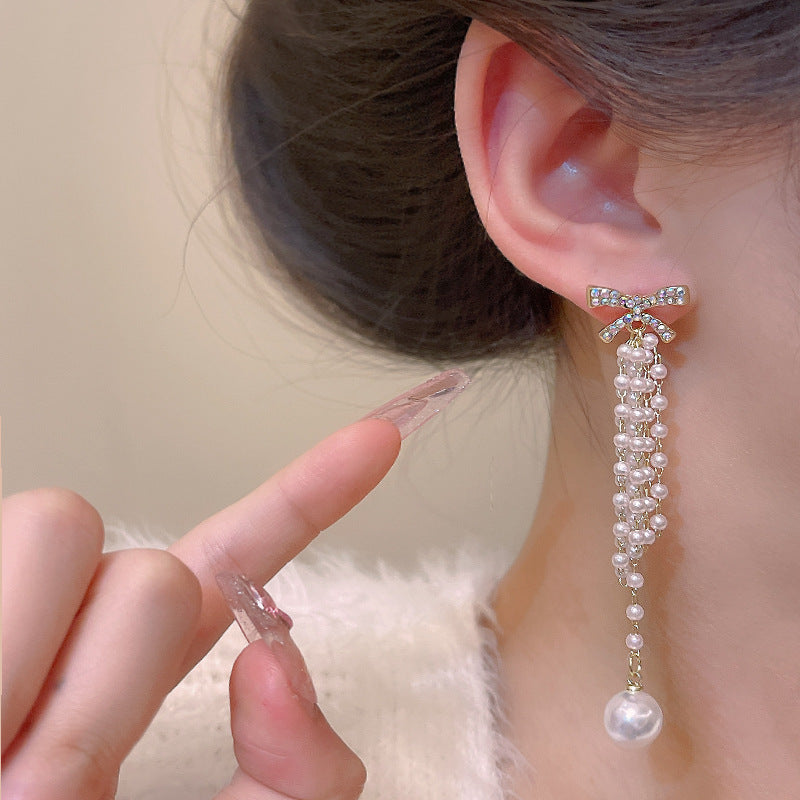 Wholesale Bow Knot Pearl Tassel Alloy Earrings