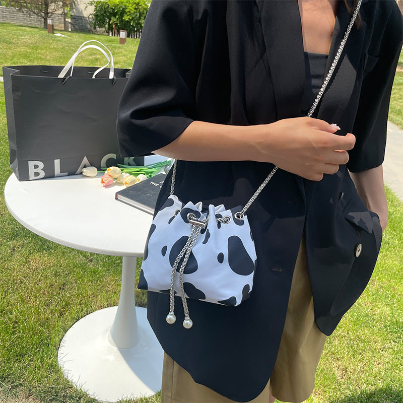 Wholesale Canvas Cow Print Leopard Chain Shoulder Bag