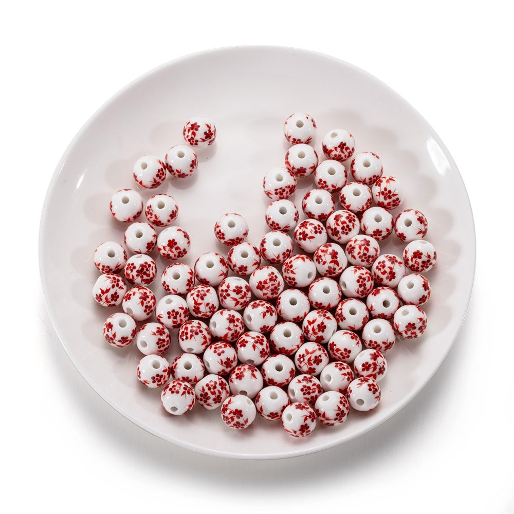 Al por mayor 10pcs/paquete de colgantes de ciruela de cerámica de estilo chino cuentas de cuerda de bricolaje de bricolaje