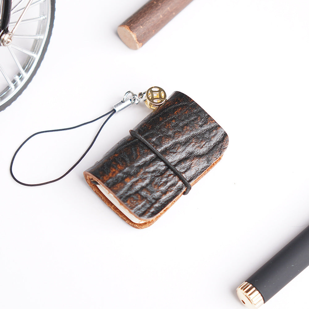 Wholesale mini pocket creative cowhide handmade multi-purpose leather notebook