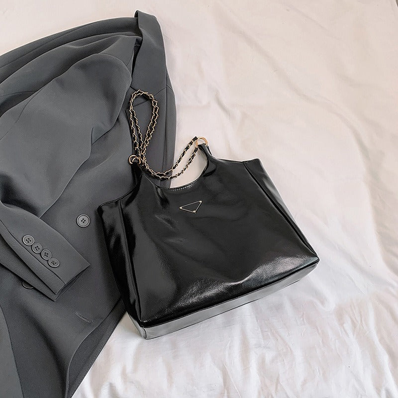 Wholesale synthetic leather shoulder armpit bag commuting large bag women's fashion tote bag class bag