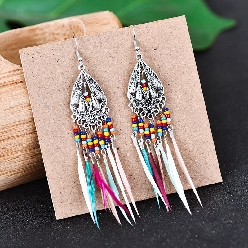 Wholesale Alloy Hollow Long Feather Earrings