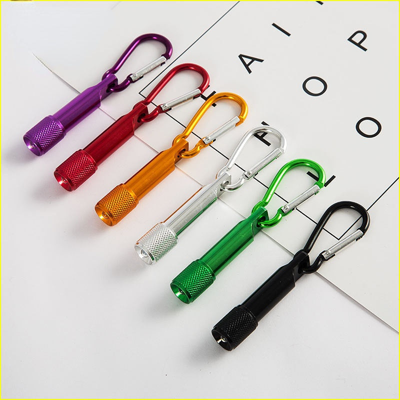 Comercio al por mayor LED resplandor pequeño llavero de aleación de zinc linterna