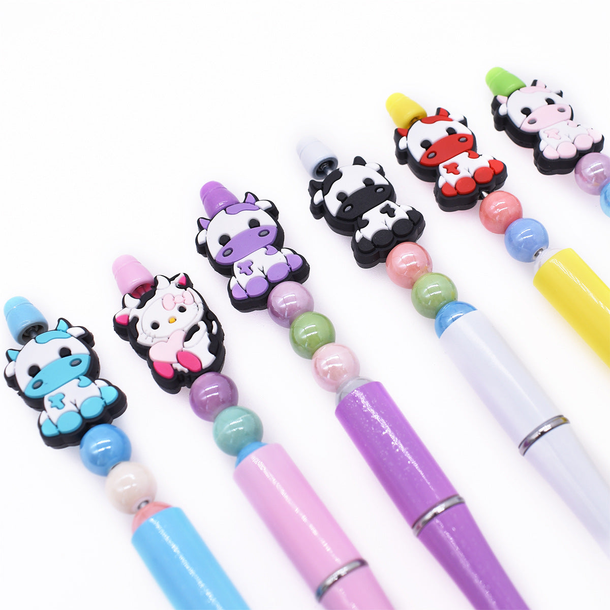 Wholesale Random 100pcs Cartoon Colored Cow PVC Soft Rubber Beads