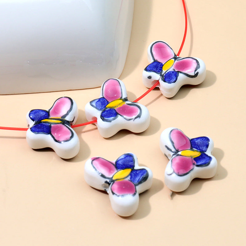 Color al por mayor Peeds de la cadena de cerámica de mariposa pintada a mano.