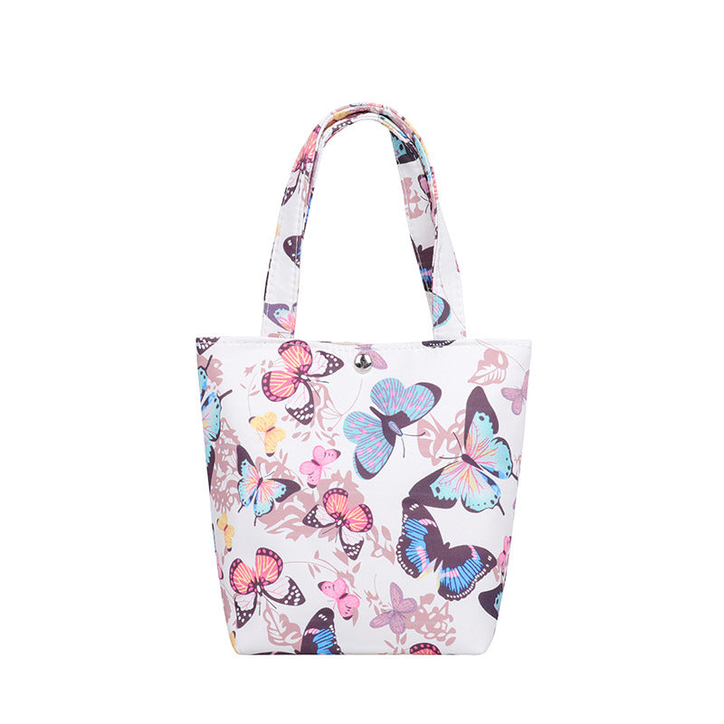 La bolsa de asas de mariposa con estampado de leopardo y estampado de vaca de poliéster al por mayor