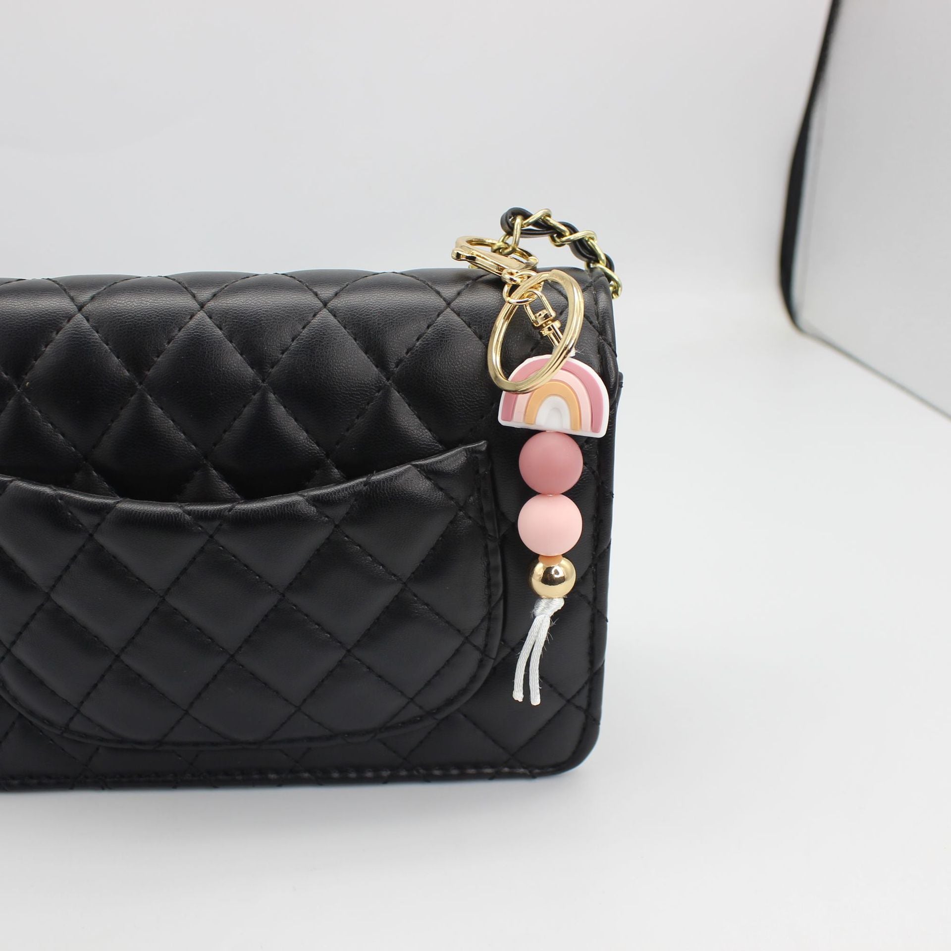 Venta al por mayor Llavero Con Cuentas De Silicona Arco Iris