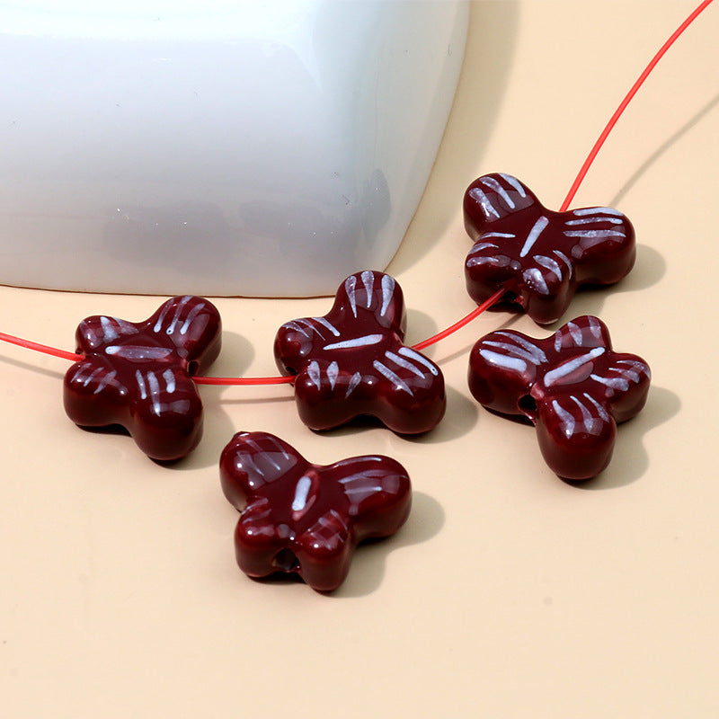 Color al por mayor Peeds de la cadena de cerámica de mariposa pintada a mano.