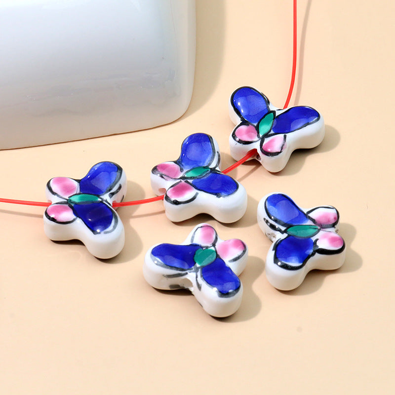 Color al por mayor Peeds de la cadena de cerámica de mariposa pintada a mano.