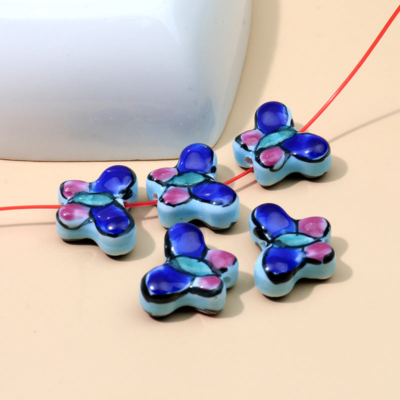 Color al por mayor Peeds de la cadena de cerámica de mariposa pintada a mano.